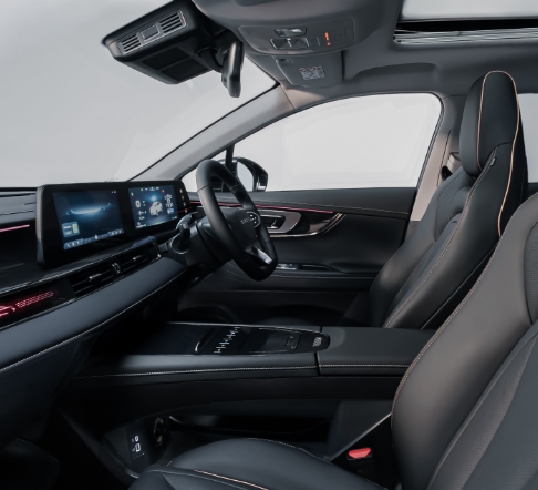 Omoda E5 — front cabin view showing seats and centre console