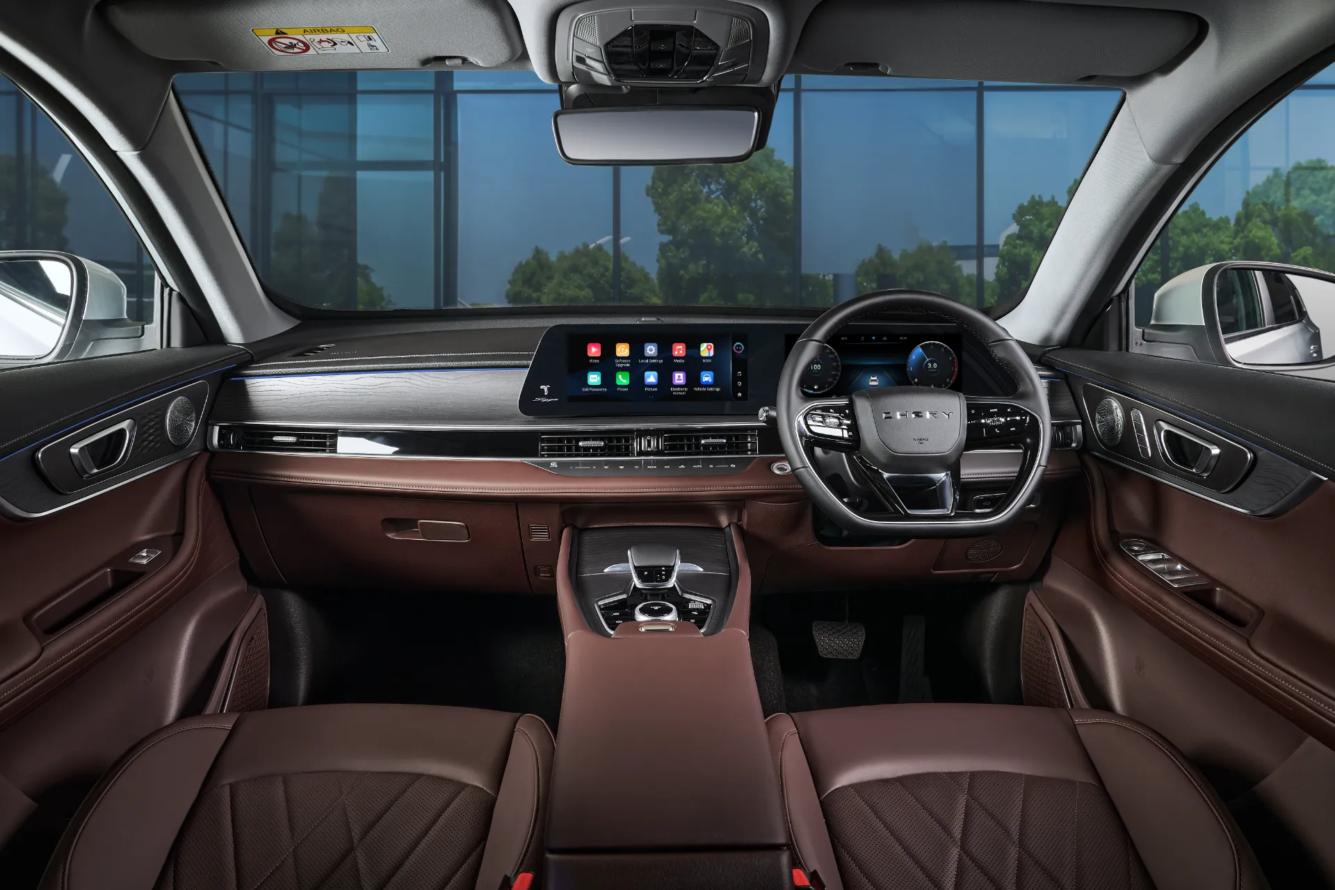 Chery Tiggo 8 Pro — full cabin view of dashboard, dual screens and steering wheel