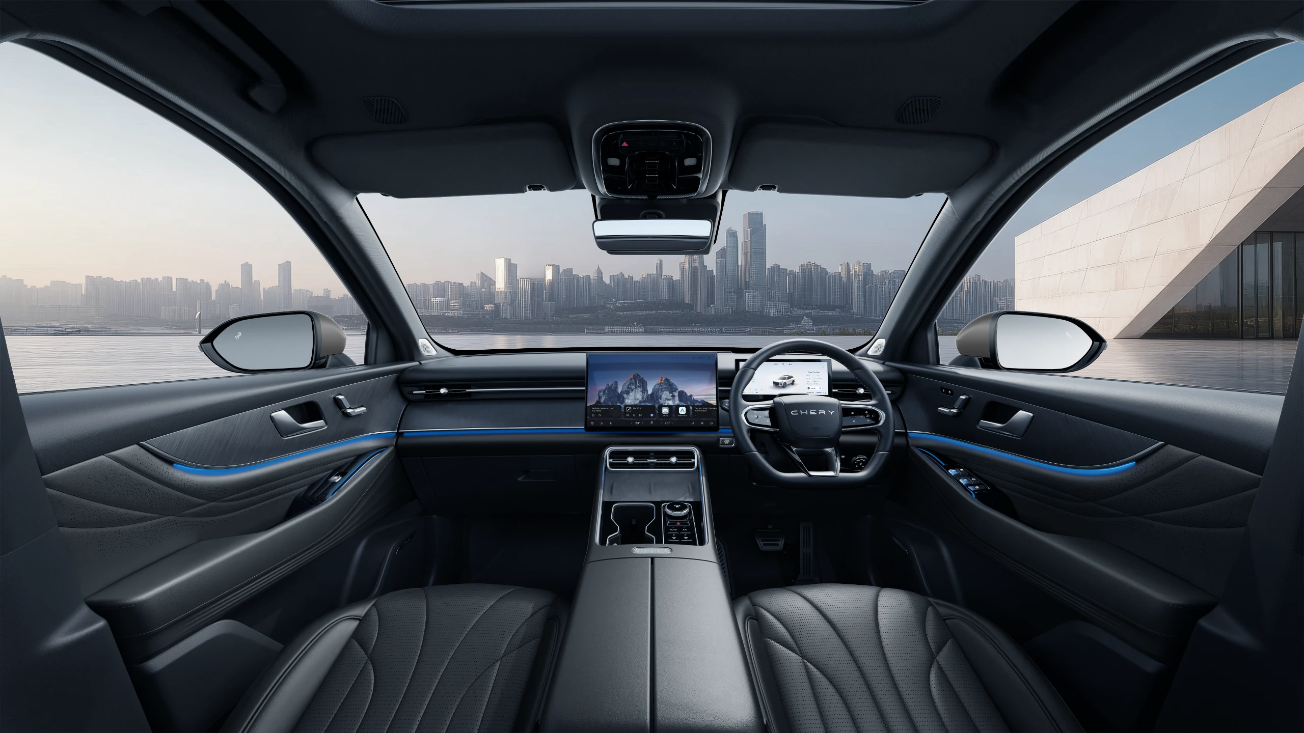 Chery Tiggo 9 — cabin view of dashboard, dual screens and steering wheel