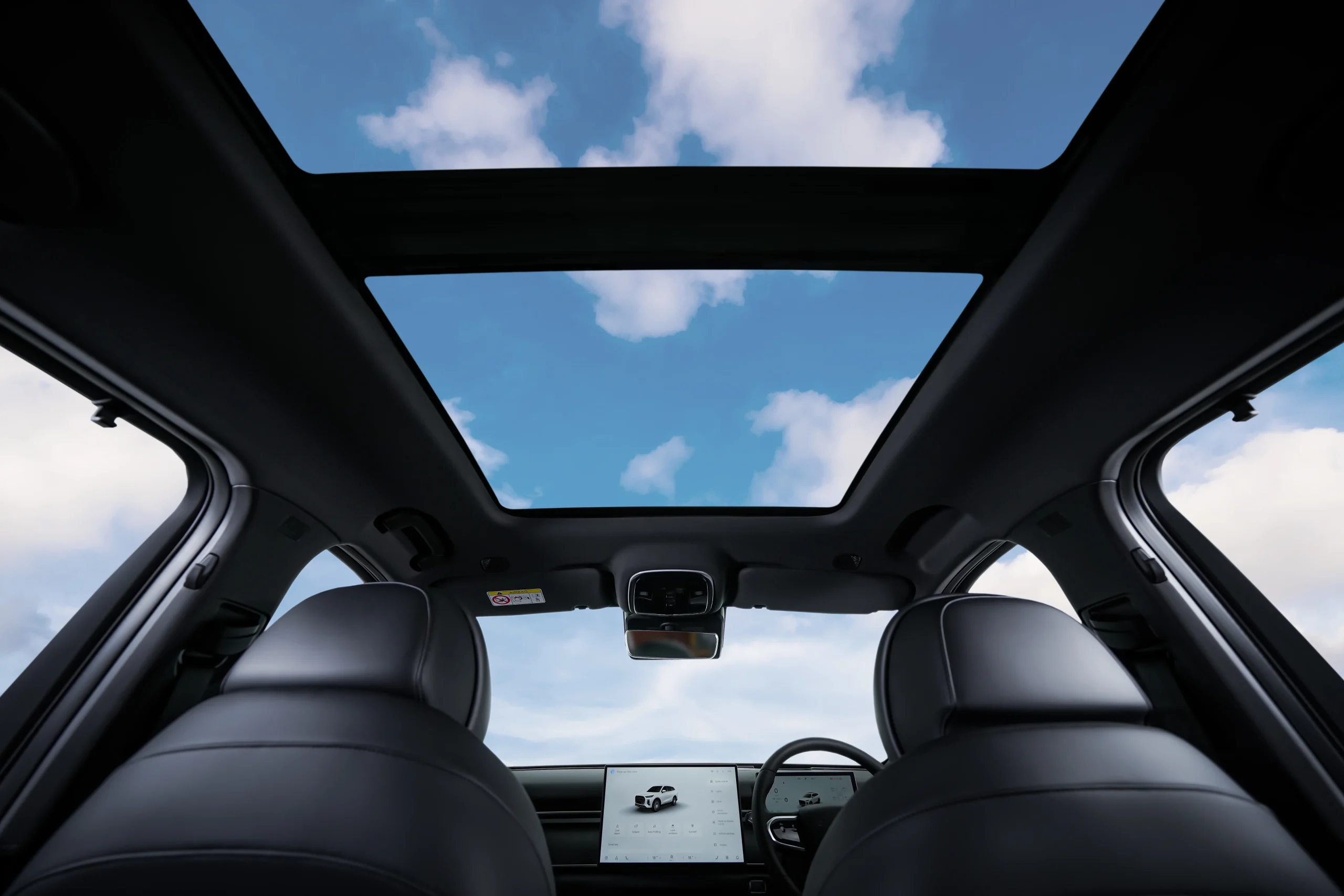 Chery Tiggo 9 — panoramic sunroof view from inside the cabin